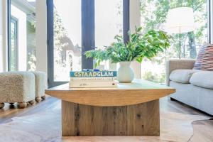 a book on a table in a living room at Luxury Home with Vail Mountain View in Vail