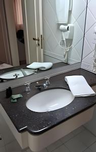Bilik mandi di Flat Hotel Executivo Vila Olímpia (Apto 2509) +2 gambar