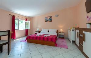 Ένα ή περισσότερα κρεβάτια σε δωμάτιο στο Six-Bedroom Holiday Home In Klek