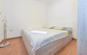 Postel nebo postele na pokoji v ubytování Holiday Home Jezera With Sea View I