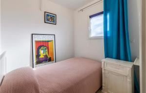 Postel nebo postele na pokoji v ubytování Apartment Premantura Iii