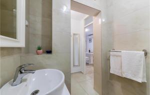 Koupelna v ubytování Apartment Premantura Iii