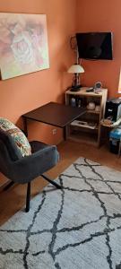 TV a/nebo společenská místnost v ubytování Ferienwohnung Piccolino