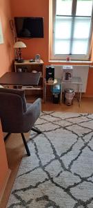 TV a/nebo společenská místnost v ubytování Ferienwohnung Piccolino + 4 fotografie