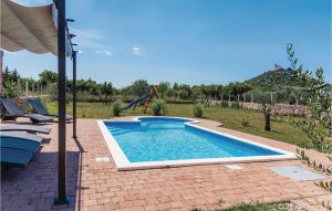 Bazén v ubytovaní 4 Bedroom Nice Home In Vodice alebo v jeho blízkosti + 32 fotografií