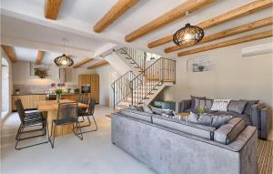 a living room with a couch and a table at Villa Luvi in Rovinj
