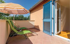 Balkón nebo terasa v ubytování Two-Bedroom Holiday Home In Banjole