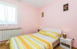Posteľ alebo postele v izbe v ubytovaní Gorgeous Apartment In Matulji With Wifi