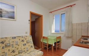 Ein Bett oder Betten in einem Zimmer der Unterkunft Apartment Prigradica V