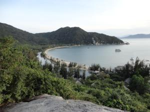 a view of a beach with a boat in the water at L'Alya Ninh Van Bay in Ninh Van Bay