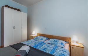 Postel nebo postele na pokoji v ubytování Beautiful Apartment In Pinezici