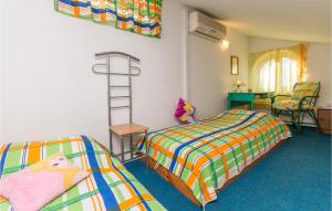 Posteľ alebo postele v izbe v ubytovaní Cozy Apartment In Sukosan With Wifi