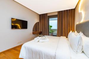 Ένα ή περισσότερα κρεβάτια σε δωμάτιο στο Royal Senior Suite 3Bd & 3Ba -By Appart Ayla