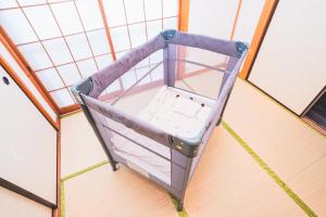 เตียงในห้องที่ New! Kamata close Haneda AP - Traditional & Hot Spring