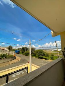 a view of a street from a balcony at Belo Espaço in Indaiatuba +4 photos