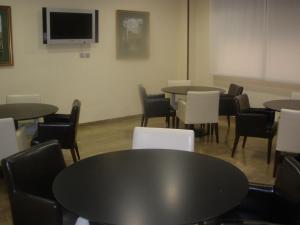 TV a/nebo společenská místnost v ubytování Hotel Elena María