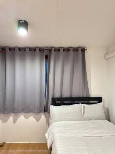 Postel nebo postele na pokoji v ubytování Chubbi 5 Room10