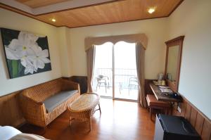 TV a/nebo společenská místnost v ubytování Cingjing Four Seasons B&B