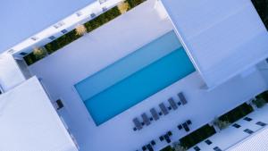 Bazén v ubytování วัน บัดเจท เชียงราย บายพาสตะวันออก One Budget Hotel Chiangrai Bypass-East nebo v jeho okolí