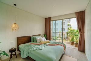 Postel nebo postele na pokoji v ubytování Camfusion House