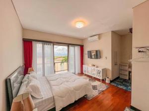 Ένα ή περισσότερα κρεβάτια σε δωμάτιο στο 3 Bedroom Private Villa With Pool In Nusa Dua