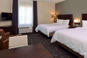 Ένα ή περισσότερα κρεβάτια σε δωμάτιο στο Extended Stay America Suites - Donaldsonville - Gonzales
