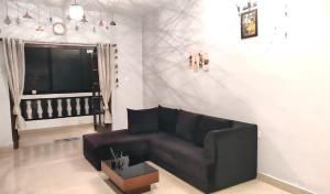 Istumisnurk majutusasutuses Cozy 1BHK Candolim beachgoa