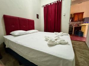 Postel nebo postele na pokoji v ubytování Hostal Los Girasoles by Hostal Inn