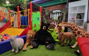 a group of stuffed animals in a play room at Holiday Villa Resort & Beachclub Langkawi in Pantai Cenang