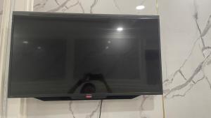 TV a/nebo společenská místnost v ubytování BÔNG SEN HOTEL CÔN ĐẢO