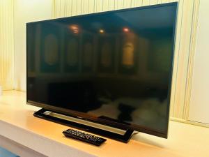 TV i/ili zabavni centar u objektu 富士Outlet温泉Hotel