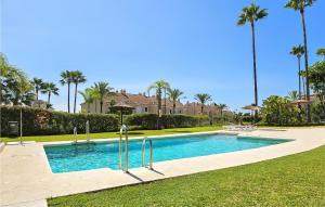 The swimming pool at or close to Gorgeous Home In Benahavís With Wifi