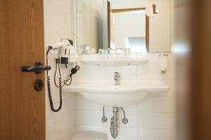 Koupelna v ubytování UNO Hotel Posthof Saarlouis