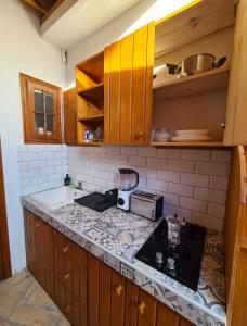 Kuchyň nebo kuchyňský kout v ubytování La Casita de Madera