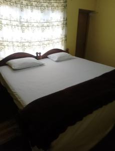 Ohiya View Resort客房内的一张或多张床位