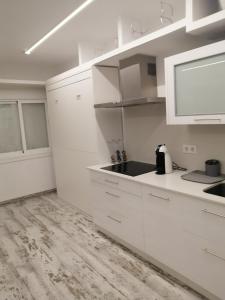 Η κουζίνα ή μικρή κουζίνα στο A Cabana ARENAL VIGO +6 φωτογραφίες