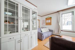 Ένα ή περισσότερα κρεβάτια σε δωμάτιο στο DOWNTOWN　TOKO11