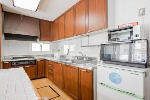 Η κουζίνα ή μικρή κουζίνα στο DOWNTOWN　TOKO11