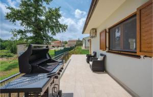 Balkón nebo terasa v ubytování Cozy Home In Cambarelici