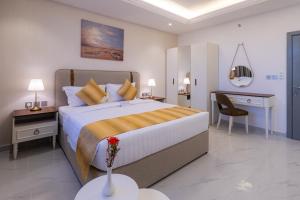 Postel nebo postele na pokoji v ubytování Neema Hotel Al Wajh + 29 fotografií