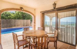 The swimming pool at or close to Beautiful Home In Sant Miquel Daro