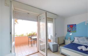 Ένα ή περισσότερα κρεβάτια σε δωμάτιο στο Nice Apartment In Baunei Nu