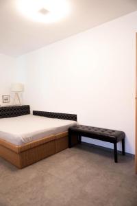 Postel nebo postele na pokoji v ubytování APARTMÁN U ZOUBKU + 10 fotografií
