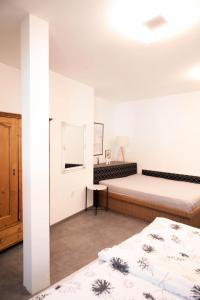 Postel nebo postele na pokoji v ubytování APARTMÁN U ZOUBKU