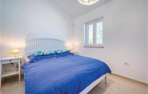 Postel nebo postele na pokoji v ubytování Cozy Home In Cambarelici