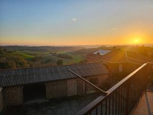 a view of the sunset from the balcony of a house at Ca' del Sole in Calliano