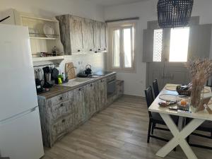 Kuchyň nebo kuchyňský kout v ubytování Villa Tranquilita