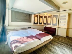Krevet ili kreveti u jedinici u objektu 富士Outlet温泉Hotel