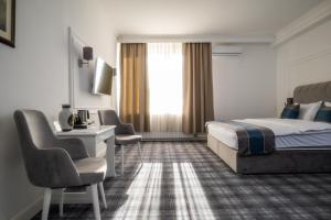 Postelja oz. postelje v sobi nastanitve Hotel Mio City