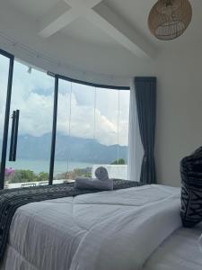 Postel nebo postele na pokoji v ubytování TUGU Bali glamping